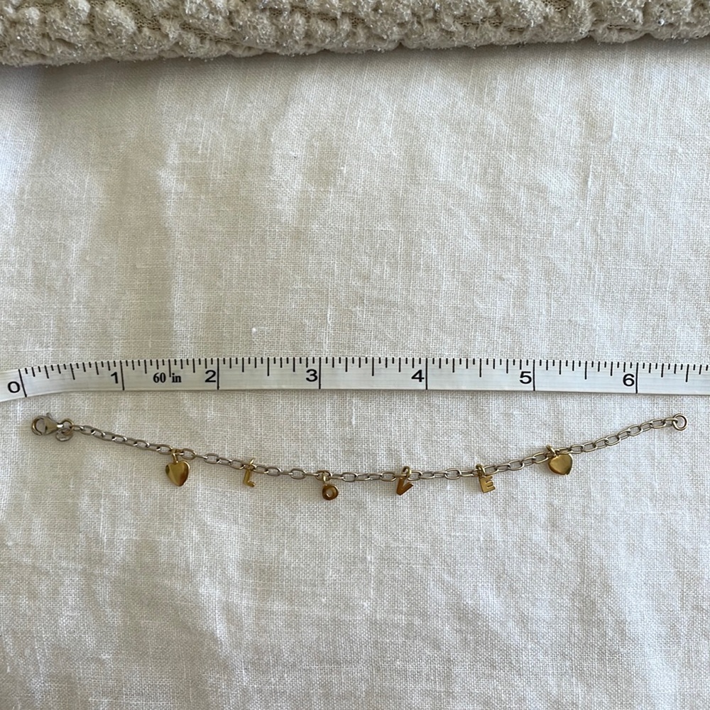 14k Gold “LOVE” bracelet with heart charms